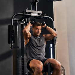 Example of a man about to perform a tricep extension using the Hammer multi-gym Autark 600