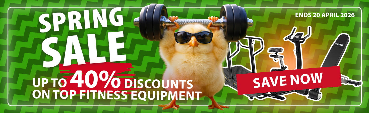Ad banner with dark colors. In the center, an illustrated rabbit in workout clothes is shown lifting a barbell overhead. To the left, the texts read: “Easter Offers. Up to 40% discounts on top fitness equipment.” To the right, there are three pieces of fitness equipment, and the text reads: “Save now. Ends 20 April 2026.”