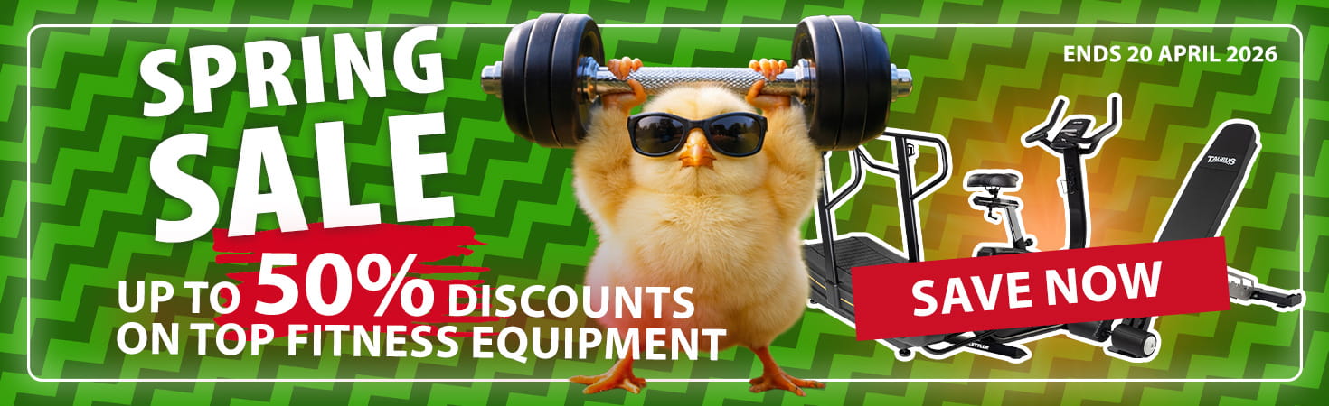 Ad banner with dark colors. In the center, an illustrated rabbit in workout clothes is shown lifting a barbell overhead. To the left, the texts read: “Easter Offers. Up to 40% discounts on top fitness equipment.” To the right, there are three pieces of fitness equipment, and the text reads: “Save now. Ends 20 April 2026.”