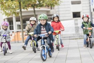 Children on Kettler balance bikes